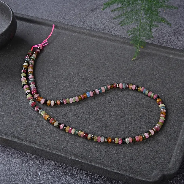 Strang Button, Turmalin (bunt), facettiert, 03 x 05mm | Marco Schreier