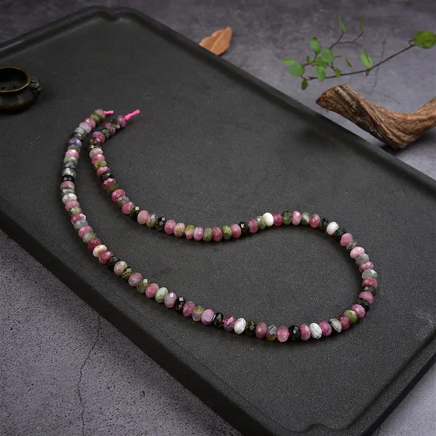 Collar de botones, Turmalina (coloreada), facetado, 04 x 06mm | Marco Schreier