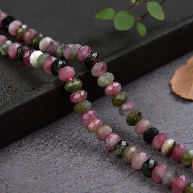 Button strand, Tourmaline (multicolour), faceted, 04 x 06mm | Marco Schreier