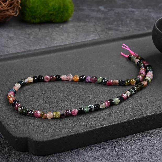 Strand of nuggets, Tourmaline (multicolour), 05 - 06mm | Marco Schreier