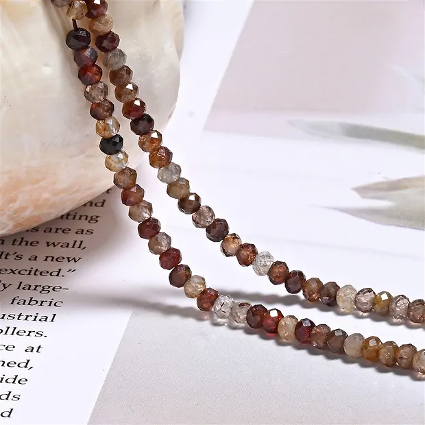 Button strand, Zircon (natural), 03 x 04mm (39cm) | Marco Schreier