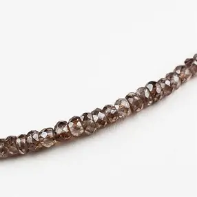 Button strand, Zircon (natural), faceted, 02 x 03mm | Marco Schreier
