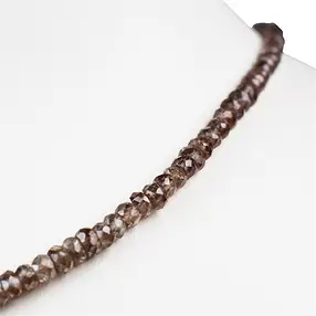 Button strand, Zircon (natural), faceted, 02 x 03mm | Marco Schreier