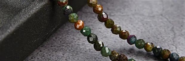 String Beads, Zoisite with Ruby, faceted, 03mm (39cm) | Marco Schreier