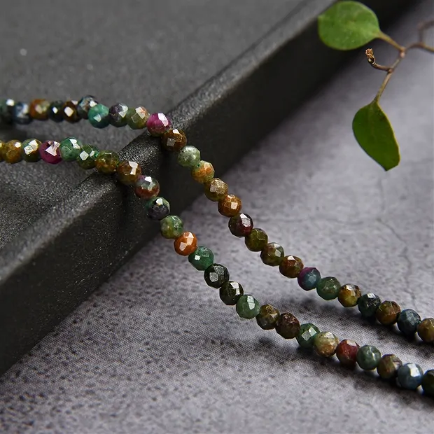 Rang de colliers boules, Zoïsite avec du rubis, à facettes, 03mm (39cm) | Marco Schreier