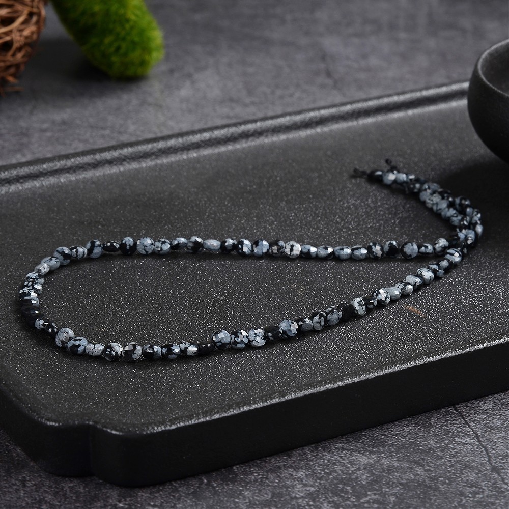 Filo di monete, ossidiana (ossidiana a fiocco di neve), 04 x 02 mm, sfaccettato (39 cm) | Marco Schreier