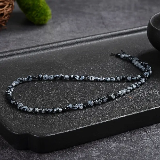 Strang Coin, Obsidian (Schneeflocke), 04 x 02mm, facettiert (39cm) | Marco Schreier