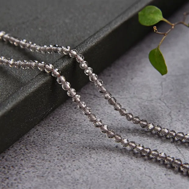 String Beads, Obsidian (Smoky), faceted, 02,5mm (39cm) | Marco Schreier