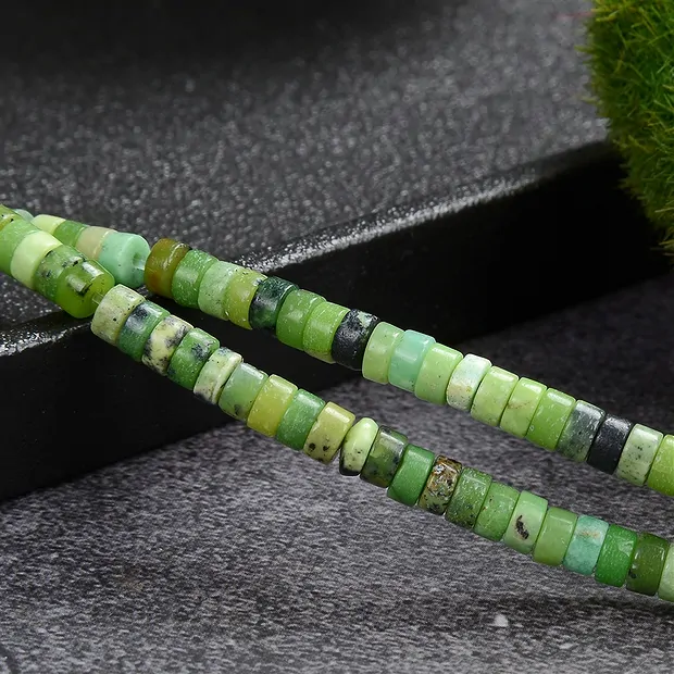 Cilindro de filamentos "Heishi", Serpentina, 02 x 05 mm (39 cm) | Marco Schreier