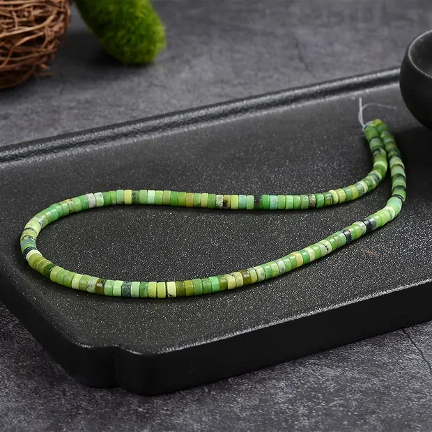 Cilindro de filamentos "Heishi", Serpentina, 02 x 05 mm (39 cm) | Marco Schreier