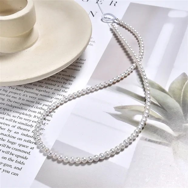 Rang de collier rond, perle d'eau douce A+, blanc-crème, 04mm | Marco Schreier