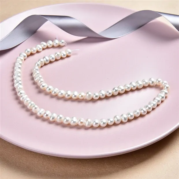 Potatoe strand, freshwater pearl, 05.5 - 06mm | wholesaler gems & healing stones