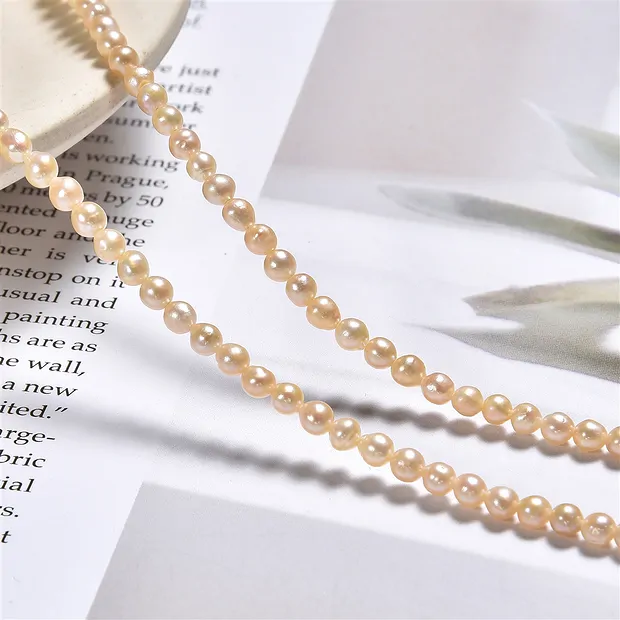 Round strand, freshwater pearl, salmon (natural), 03-04mm | Marco Schreier