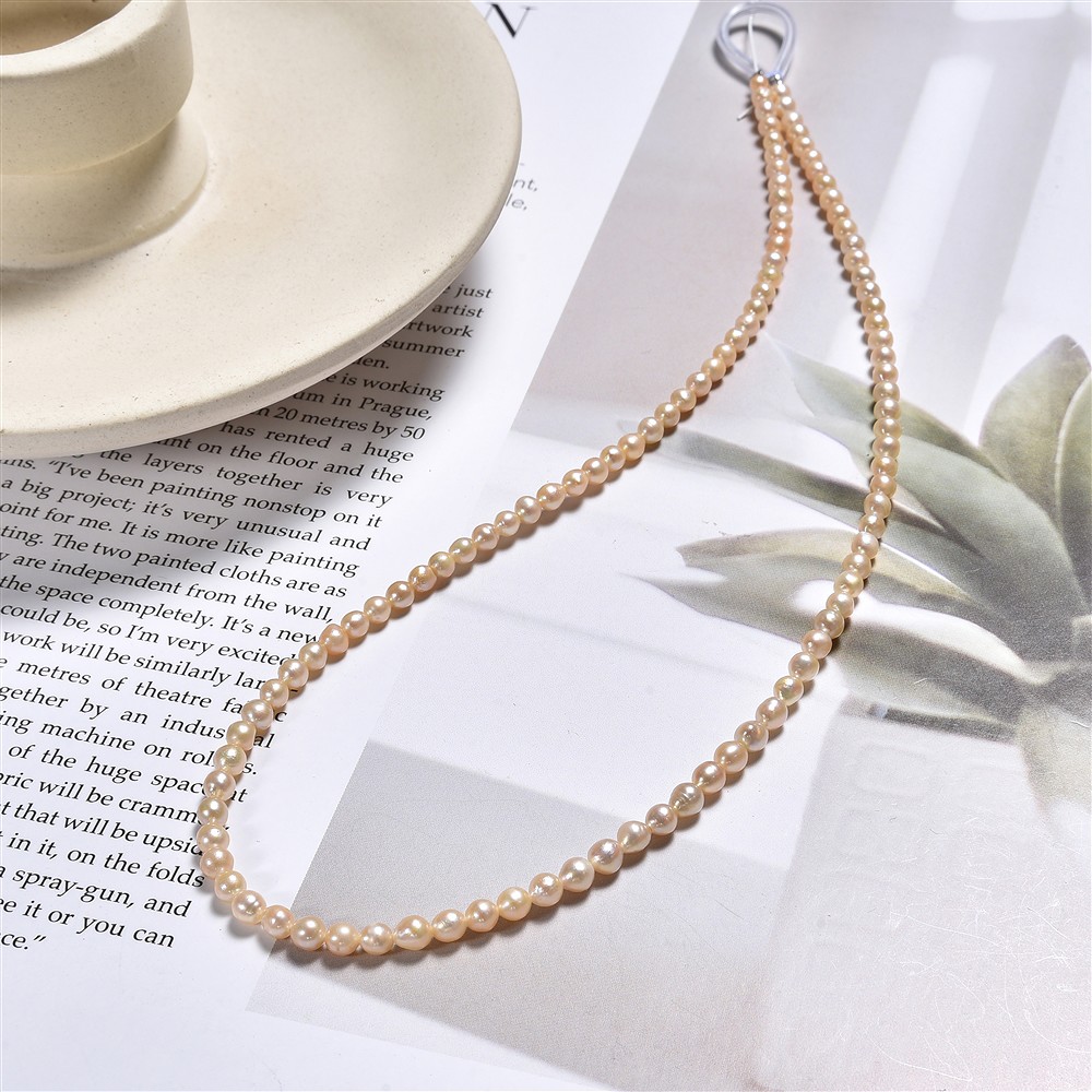 Round strand, freshwater pearl, salmon (natural), 03-04mm | Marco Schreier