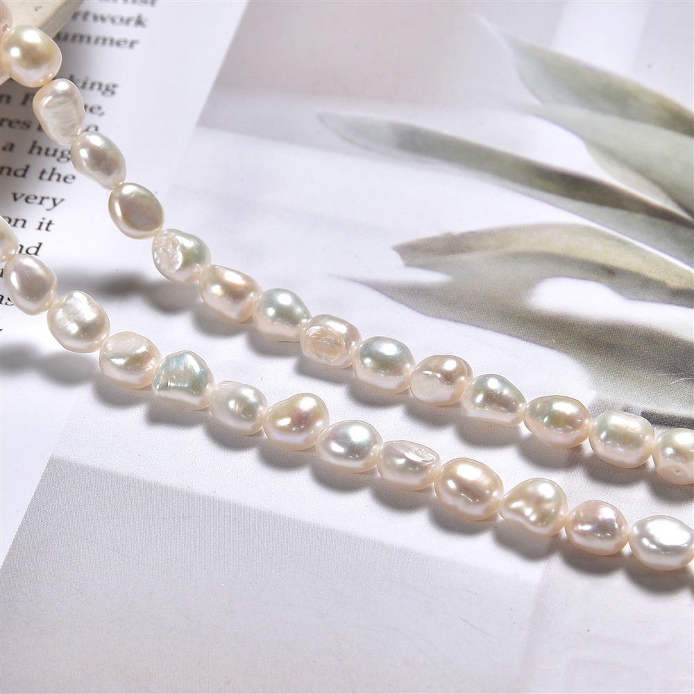 Strand freeform flat, freshwater pearl, white-cream, 06 - 07mm | Marco Schreier