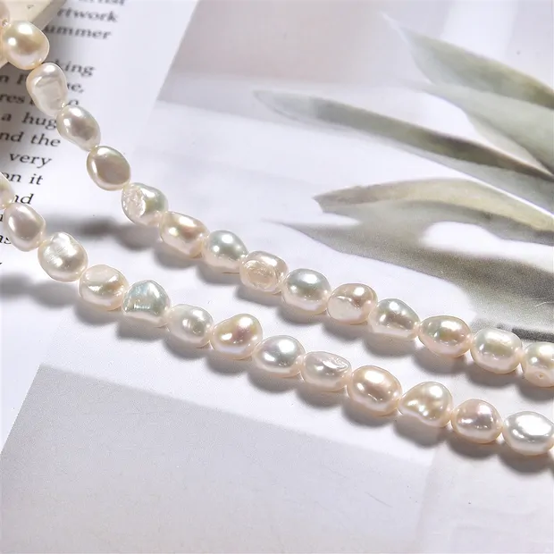Rang de colliers Freeform plat, perle d'eau douce, blanc-crème, 06 - 07mm | Marco Schreier