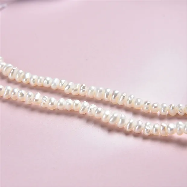 Strang Button, Süßwasser-Perle, 04,5mm | Edelsteine, Heilsteine & Schmuck-Handel