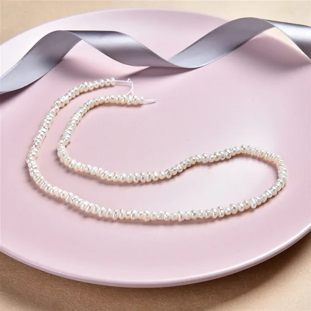 Strang Button, Süßwasser-Perle, 04,5mm | Edelsteine, Heilsteine & Schmuck-Handel