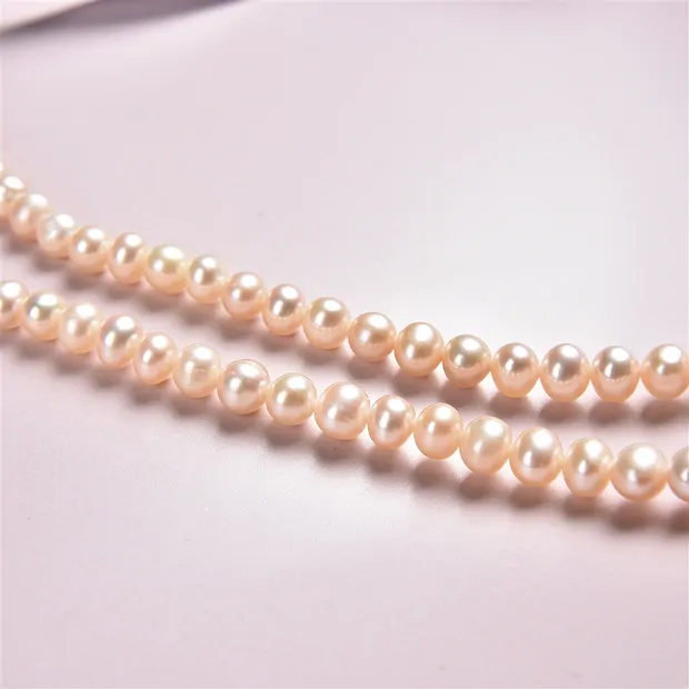 Strand Potatoe, freshwater pearl A, light salmon (natural), 04-05mm | Marco Schreier