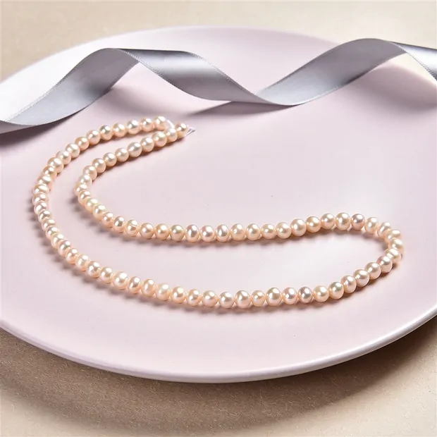 Strand Potatoe, freshwater pearl A, light salmon (natural), 04-05mm | Marco Schreier