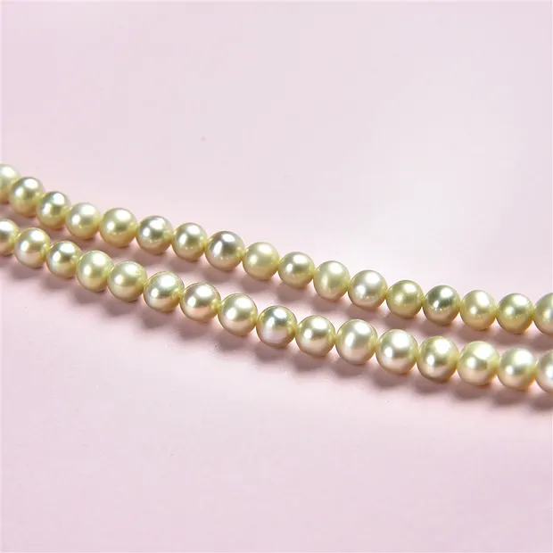 Strand Potatoe, freshwater pearl A, green (dyed), 04-05mm | Marco Schreier