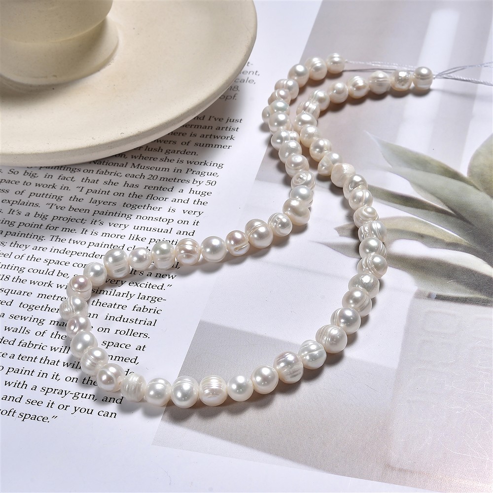 Rang de colliers Potatoe, perle d'eau douce, blanc-crème, 08-09mm | Marco Schreier