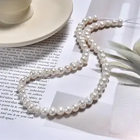 Rang de colliers Potatoe, perle d'eau douce, blanc-crème, 08-09mm | Marco Schreier