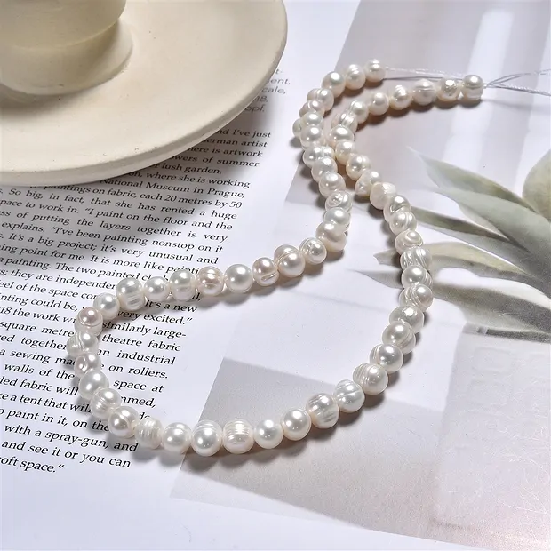 Potatoe strand, freshwater pearl, white-cream, 08-09mm | Marco Schreier