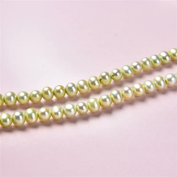 Strand Potatoe, freshwater pearl A, green (dyed), 05mm | Marco Schreier