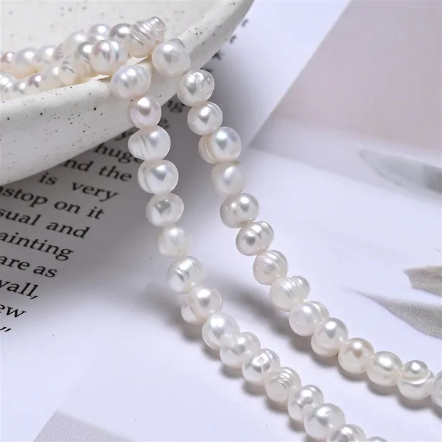 Potatoe strand, perla de agua dulce, blanco-crema, 04 - 04.5mm | Marco Schreier