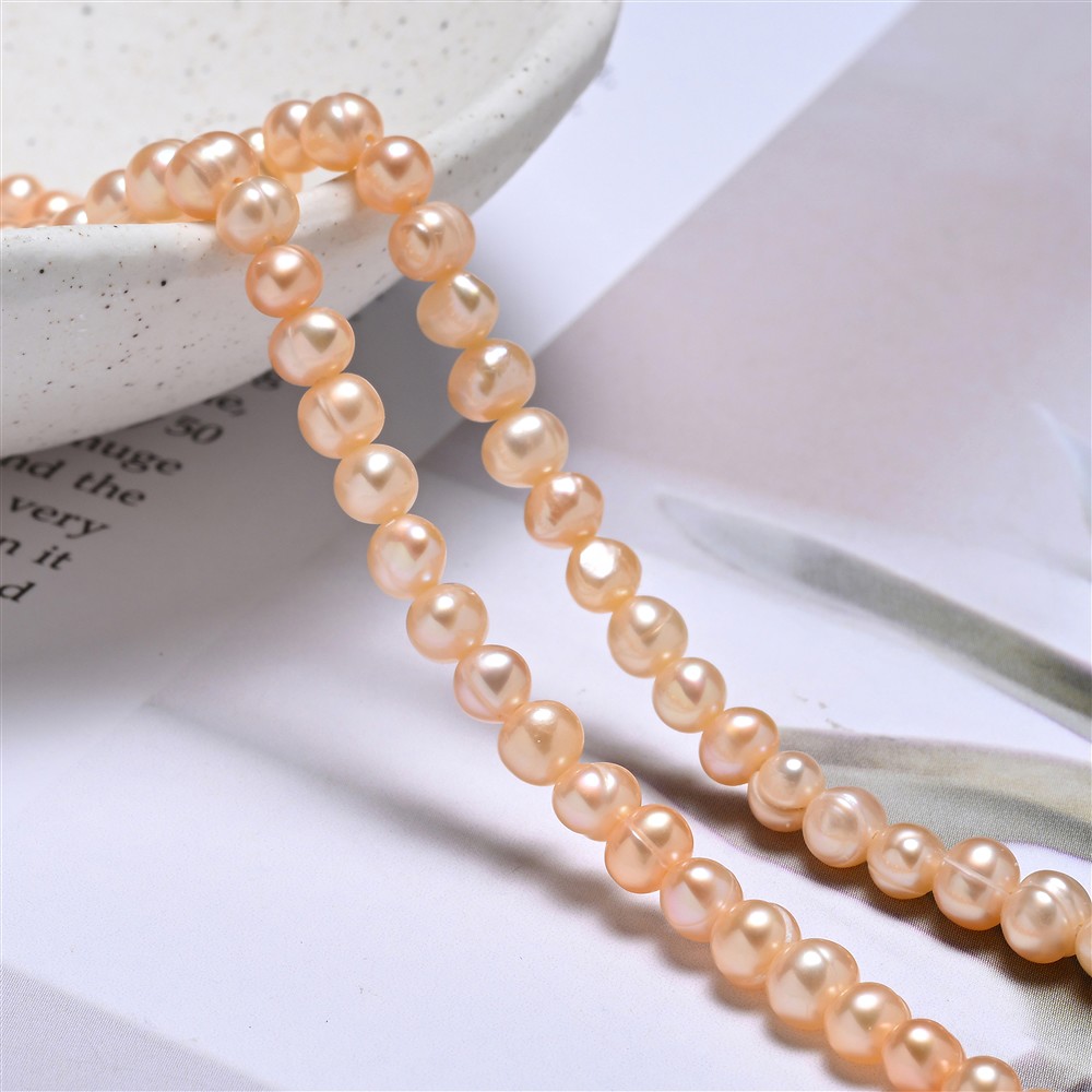 Round strand, freshwater pearls, 04,-04,5mm, salmon, 39cm | Marco Schreier