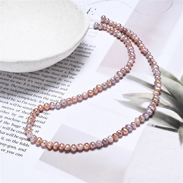 Strang Potatoe, Süßwasser-Perle, violett hell (gef.), 04 - 05mm | Marco Schreier