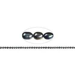 141840404283 strand rice grain, freshwater pearl AB, petrol light (dyed), 06-07mm | Marco Schreier