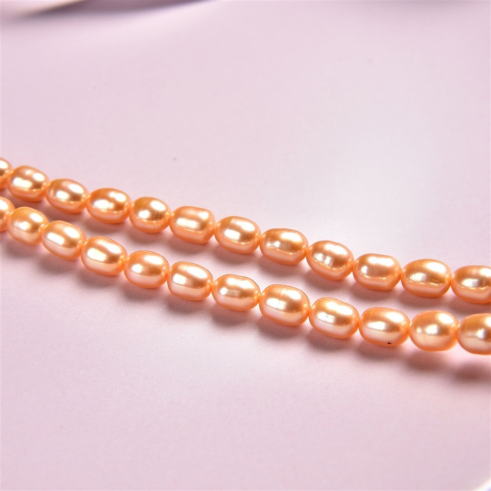 Rang de collier grain de riz, perle d'eau douce, jaune d'or (teintée), 06-07 x 05-06mm | Marco Schreier