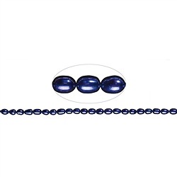 141840406344 Hebra de perla de agua dulce, grano de arroz, violeta (te&#xF1;ida), 08 - 09mm | Marco Schreier