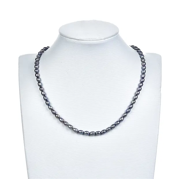 Rang de collier grain de riz, perle d'eau douce, pétrole (teintée), 06-07 x 04-05mm | Marco Schreier