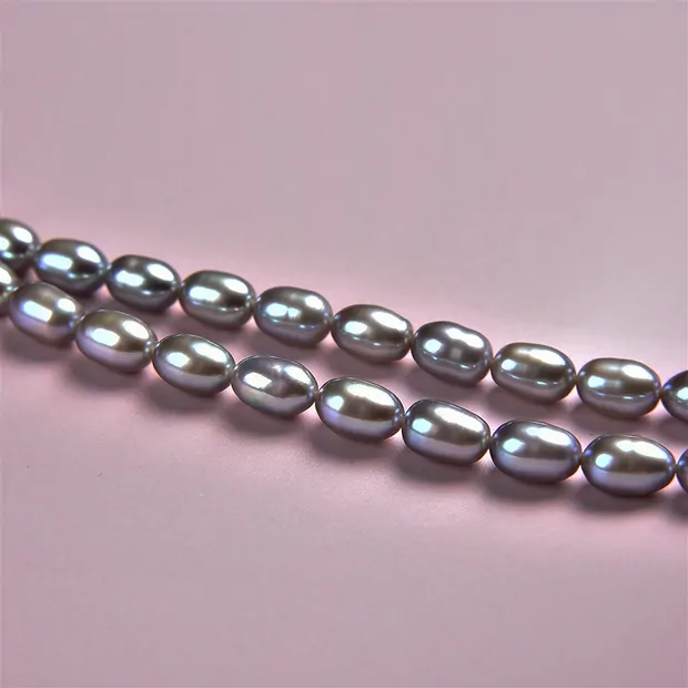 Rang de collier grain de riz, perle d'eau douce, pétrole violet (teintée), 06-07mm | Marco Schreier