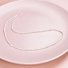 Rang de collier grain de riz, perle d'eau douce, blanc-crème, 02 - 02,3mm | Marco Schreier