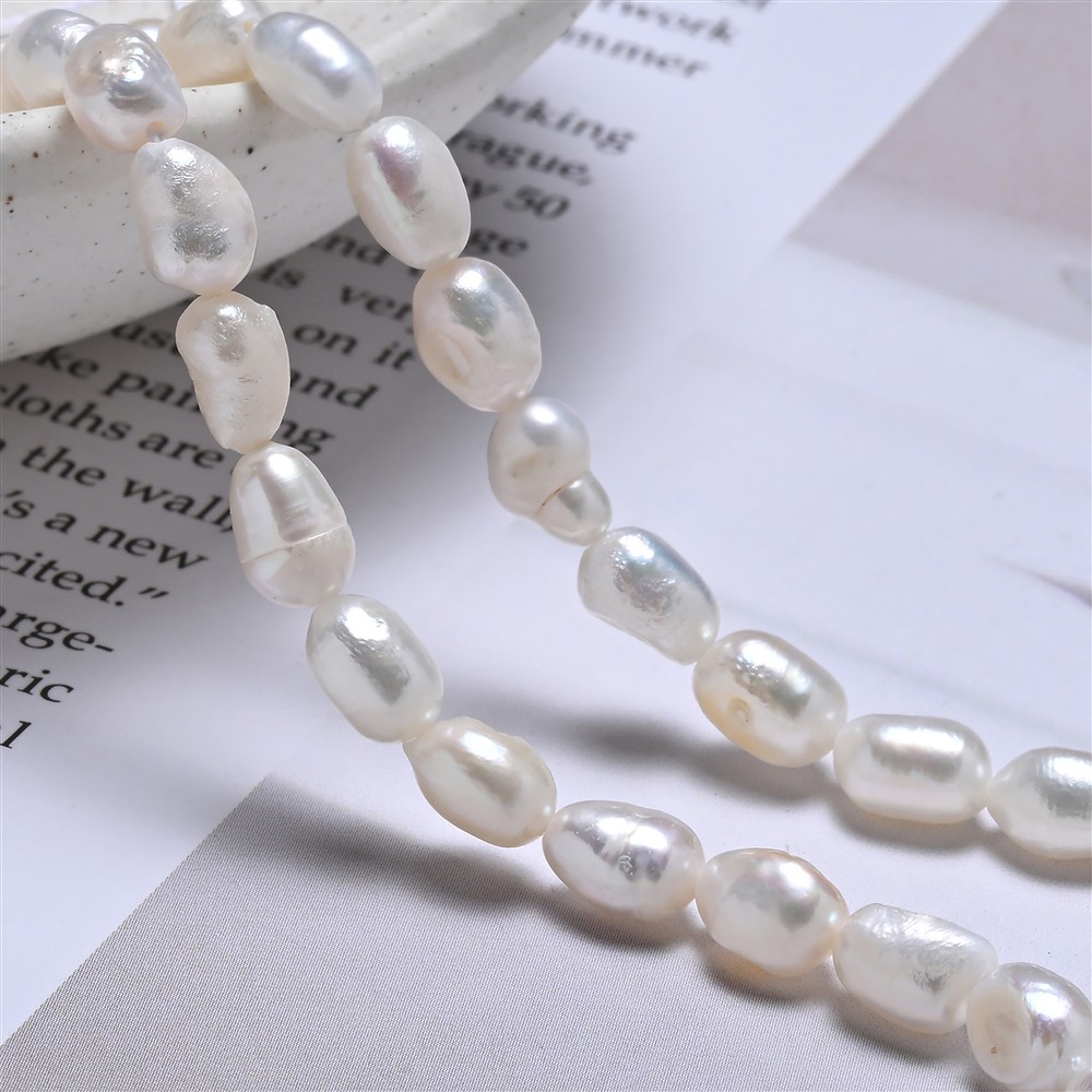 Strand of rice grain, freshwater pearl, white-cream, 07 x 05mm (39cm) | Marco Schreier