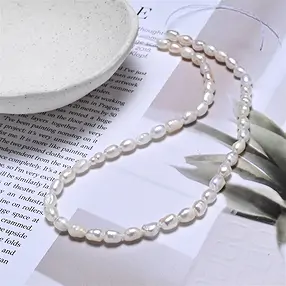 Rang de colliers grain de riz, perle d'eau douce, blanc-crème, 07 x 05mm (39cm) | Marco Schreier