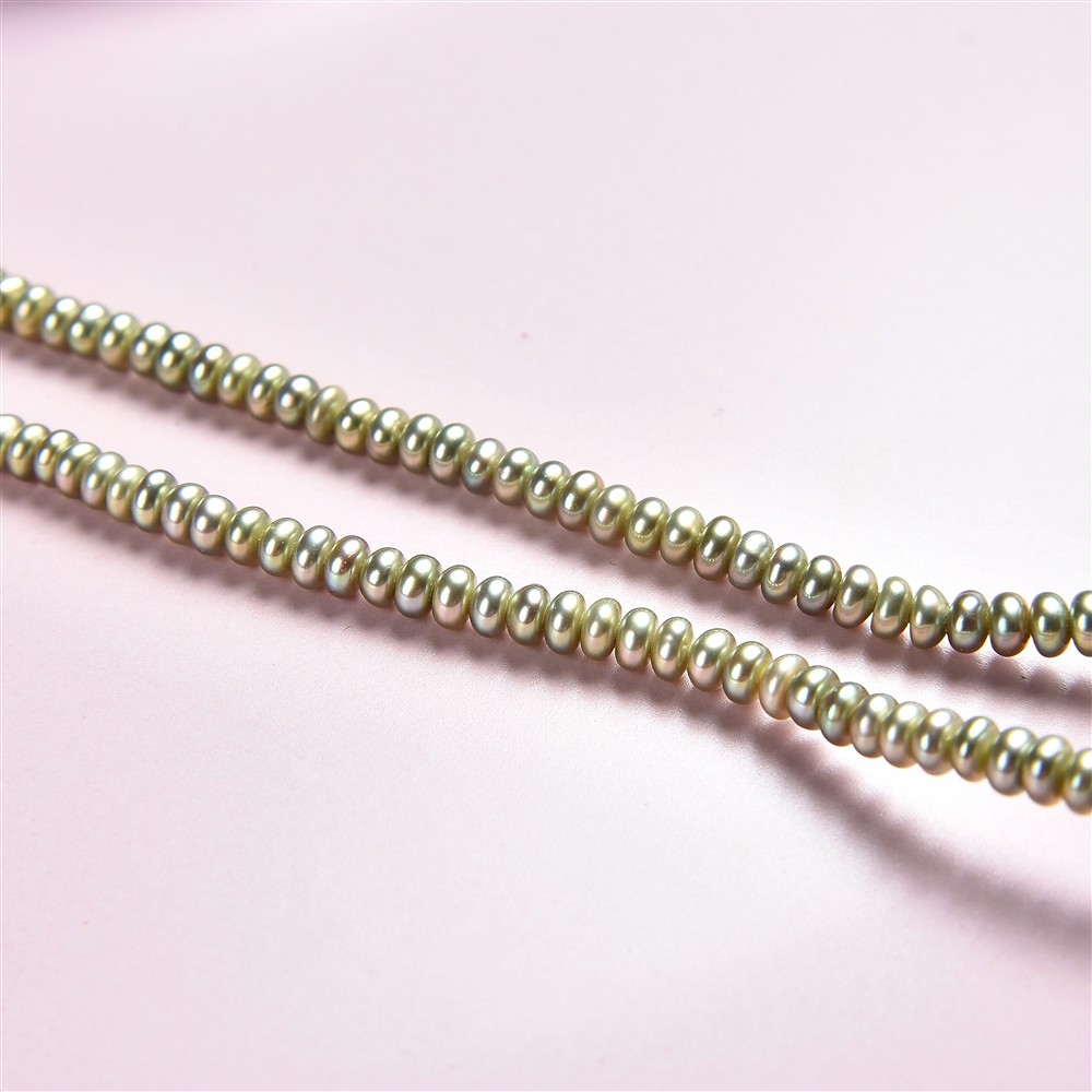 Button strand, freshwater pearl green (dyed), 02 x 03-04mm | Marco Schreier