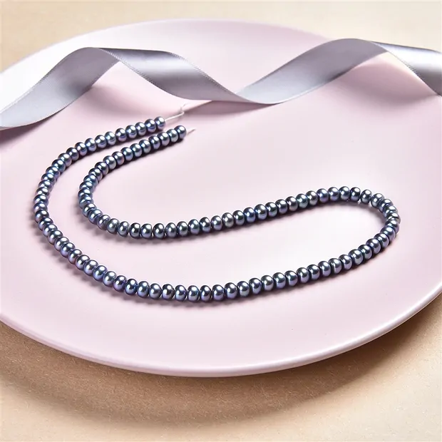 Keshi strand, freshwater pearl blue-grey (dyed), 05-06mm | Marco Schreier