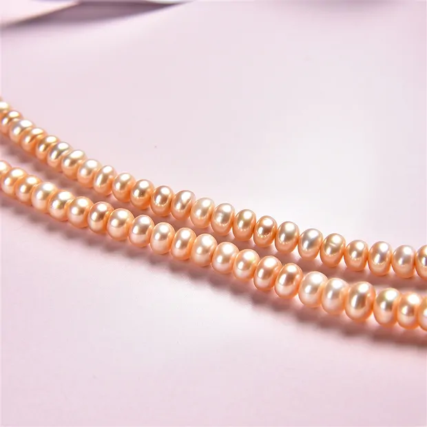 Collar de botones, perla de agua dulce salmón (natural), 03-04 x 05-06mm | Marco Schreier