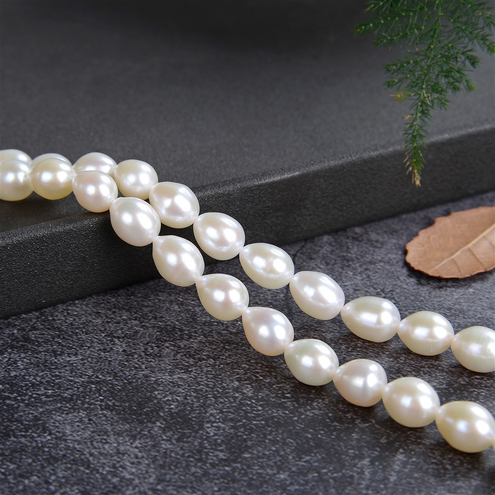 Drop strand, freshwater pearl, white-cream, 08 - 09mm | Marco Schreier