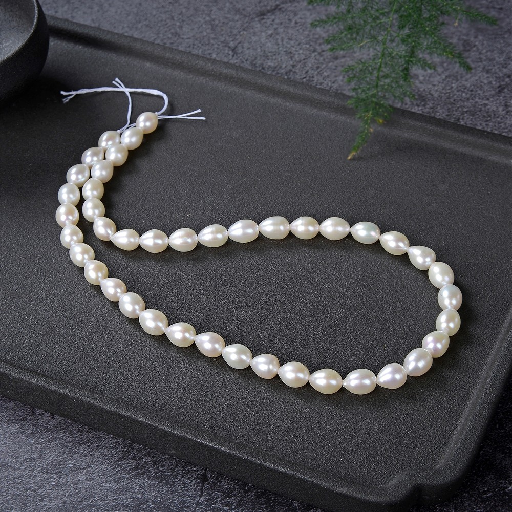 Drop strand, freshwater pearl, white-cream, 08 - 09mm | Marco Schreier