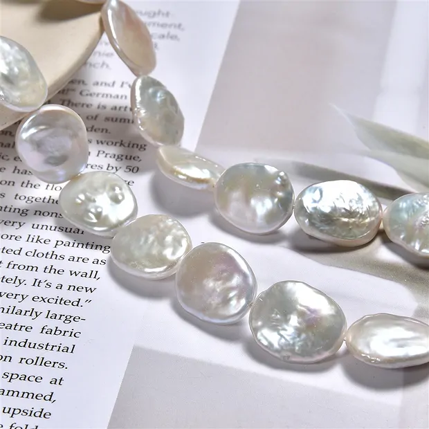Strang Coin oval, Süßwasser-Perle, weiß-creme, 18 x 15mm | Marco Schreier