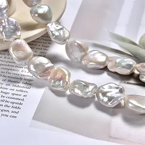 Rang de colliers Keshi, perle d'eau douce, blanc-crème, 17 x 14mm | Marco Schreier