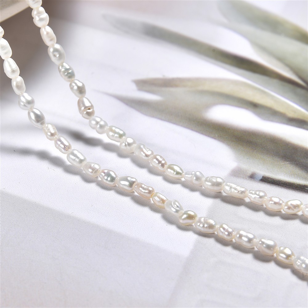 Keshi strand, freshwater pearl AB, cream-white, 09 - 12mm (39cm) | Marco Schreier