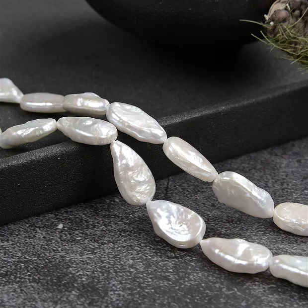 Strang Tropfen flach, Süßwasser-Perle, 014 x 08mm | Marco Schreier