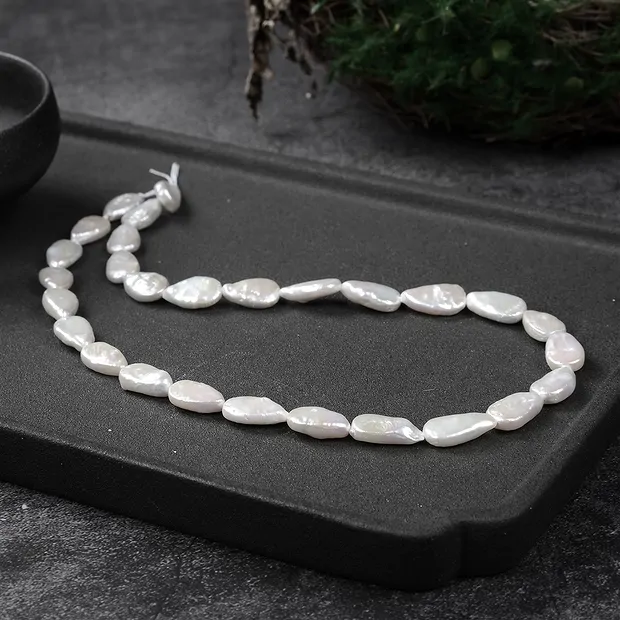 Rang de colliers goutte plate, perle d'eau douce, 014 x 08mm | Marco Schreier
